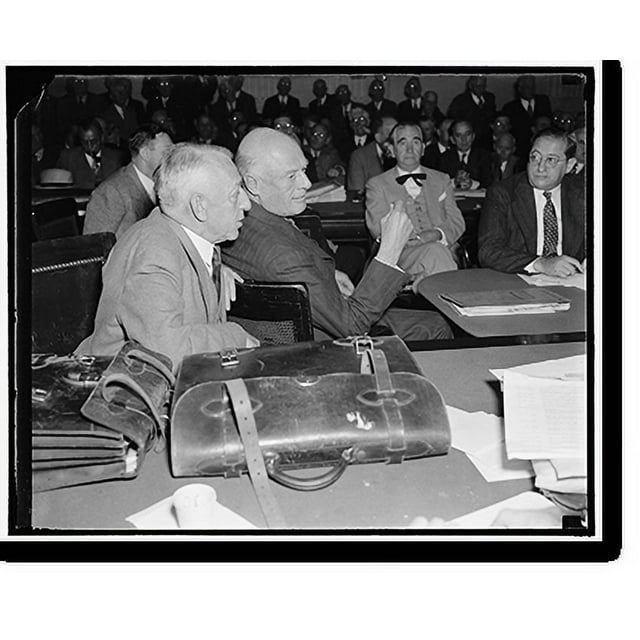 Historic Print, In huddle at rail facts finding hearing. Washington, D