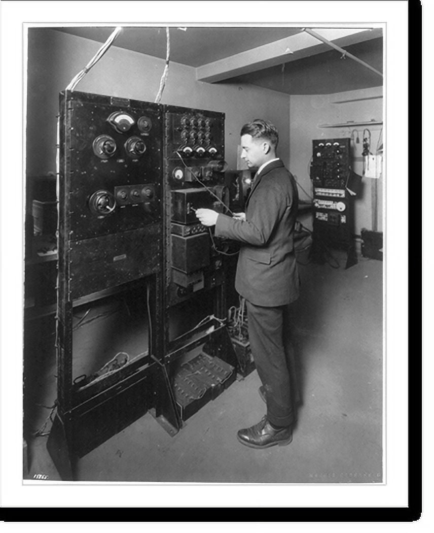 Historic Print, [J.B. Irwin operating the control panel of the Western
