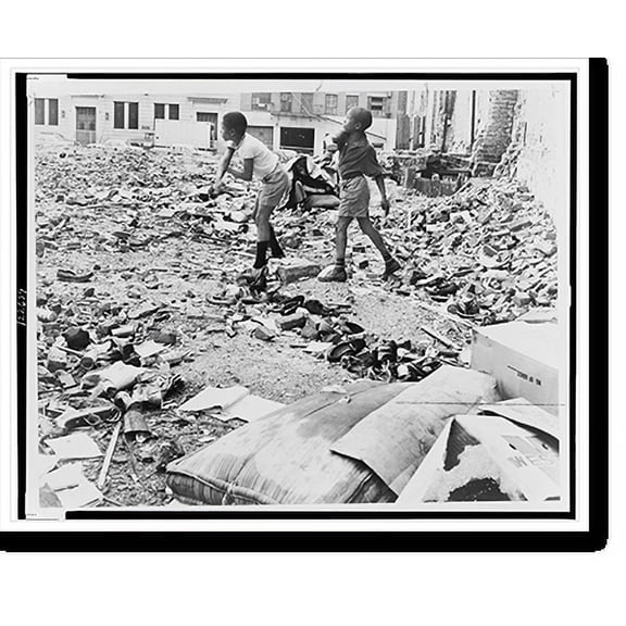 Historic Print, Kids in west side lot toss a few bricks.World Telegram & Sun photo by Ed Ford., 16" x 20"