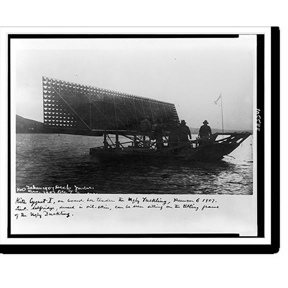Historic Print, Kite Cygnet I, on board her tender the Ugly Duckling, December 6, 1907. Lieut. Selfridge, dressed in oil-skin, can be seen sitting on the tilting frame of the Ugly Duckling, 16" x 20"