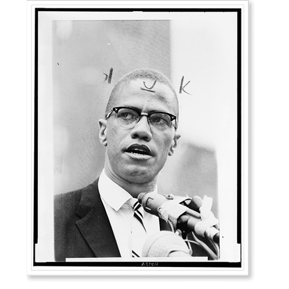 Historic Print, [Malcolm X, head-and-shoulders portrait, facing front, at microphones], 18" x 24"