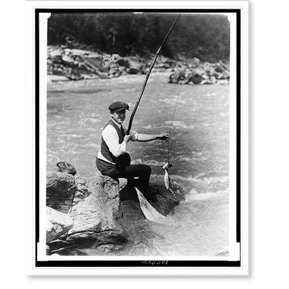 Historic Print, [Man seated on rock, with two fish on line, by stream, possibly the River, Washington, D.C. area], 16" x 20"