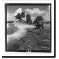 Historic Print, [Man spraying marsh to control malaria, Puerto Rico