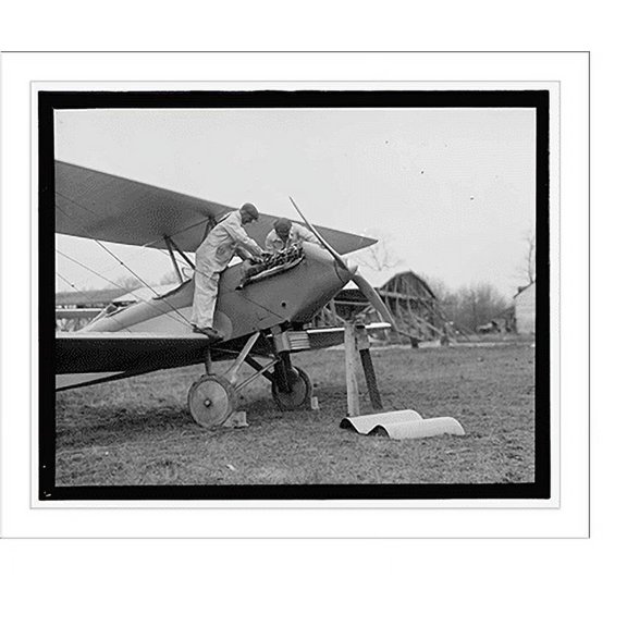 Historic Print, [Men examining airplane engine], 18" x 24"