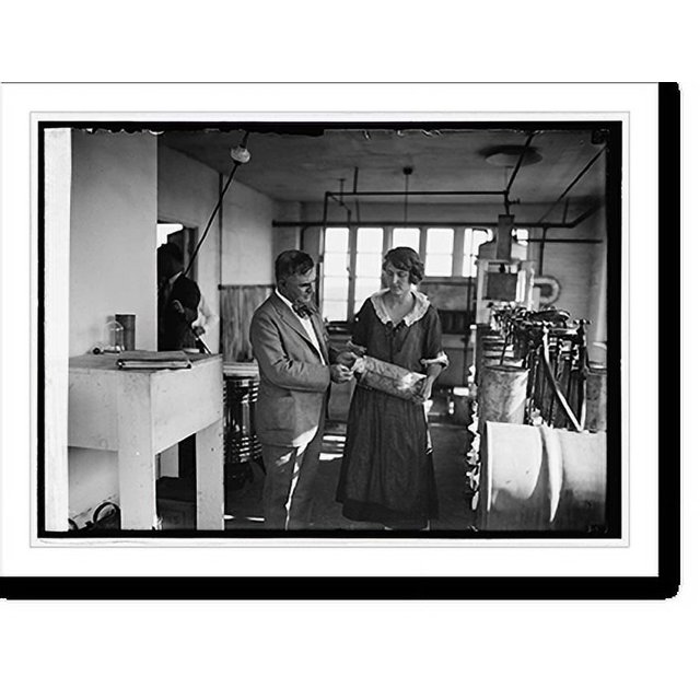 Historic Print, Miss Mary Brandon and Sec. Wallace at Beltsville, [Md.], farm methods of