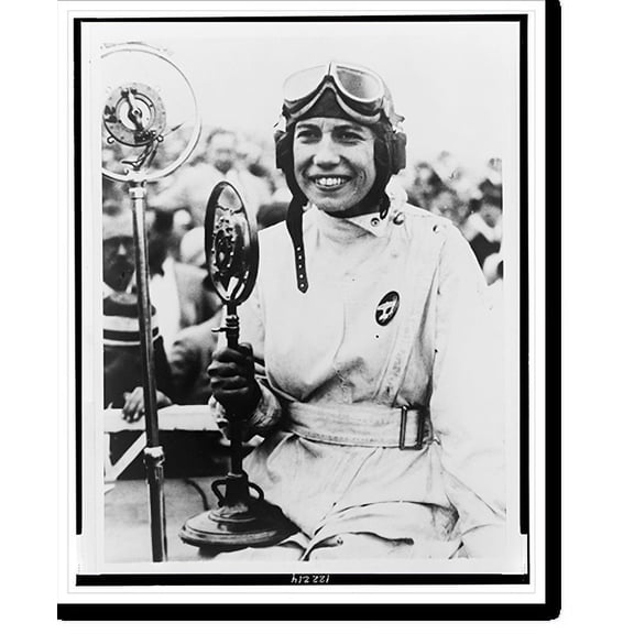 Historic Print, [Mrs. Keith Miller, half-length portrait, facing front, holding first prize tropy she won in the women's speed race of the National Air Races, Cleveland, Ohio], 16" x 20"