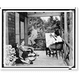 thumbnail image 1 of Historic Print, [Nancy Ross seated on porch eating picnic lunch with an unidentified man while a woman draws a portrait of another man seated on the railing around the porch].Life photo…16" x 20", 1 of 3