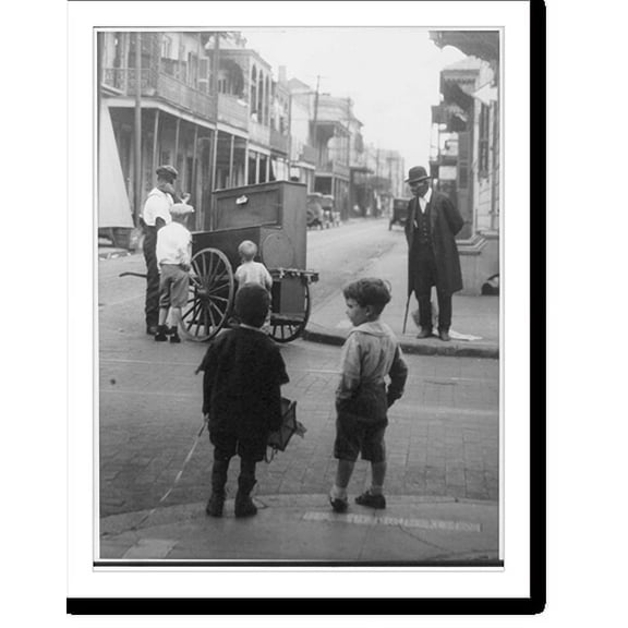 Historic Print, New Orleans, La.: [Street scene showing 4 children and an African American man watching another African American man with a hurdy-gurdy(?)], 16" x 20"