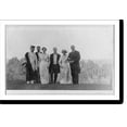 thumbnail image 1 of Historic Print, [Samuel Langhorne Clemens, 1835-1910, full-length portrait, standing, facing right, wearing cap and gown, with 5 other people at the wedding of Clara Clemens], 16" x 20", 1 of 3