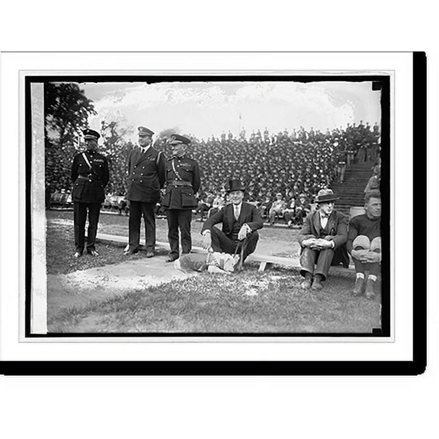 Historic Print, Sec. Wilburn and Gen. Lejeune at football game between