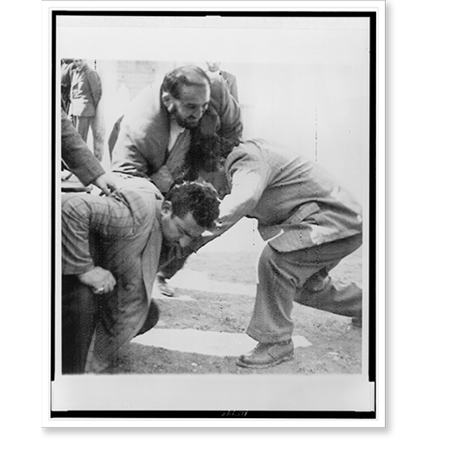 Historic Print, [Shaban Jafari, wrestles with two political dissenters