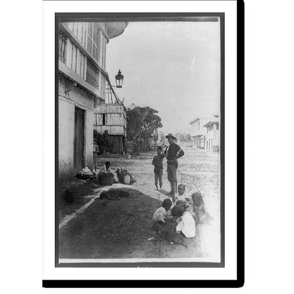 Historic Print, [Soldier on street with six native children in foreground in the Philippines], 18" x 24"
