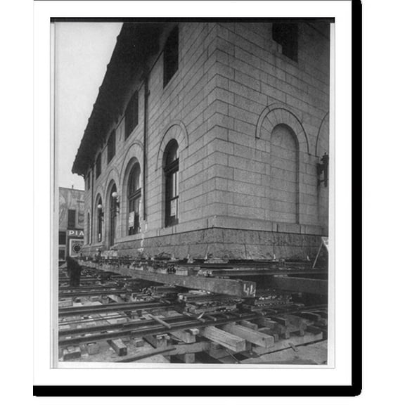 Historic Print, [St. Cloud, Minn. - Old Post Office bldg. being moved to new site: close-up; building on railroad tracks], 16" x 20"