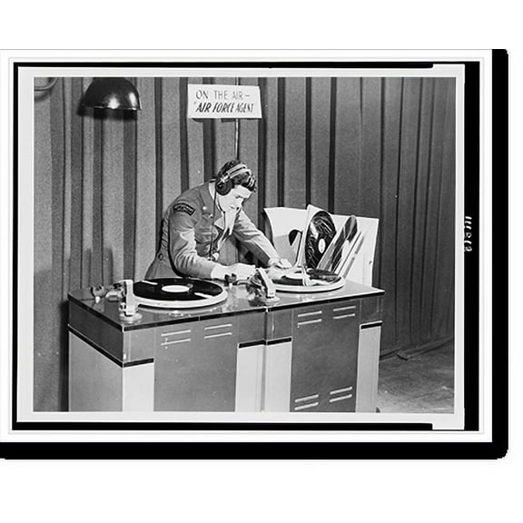Historic Print, T/5 Charles Washam of Paducah, Ky. and the American Forces Network's sound effects department queues a disc for musical background on the dramatic radio show Air Force A16" x 20"