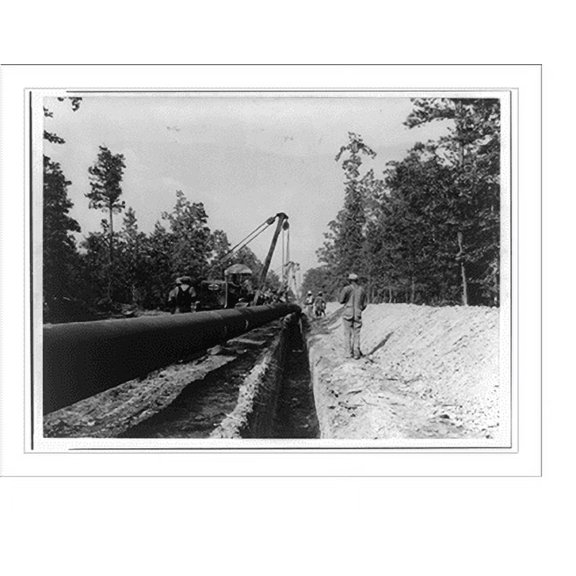 Historic Print, [The Big Inch pipeline under construction: Pipe being lowered into ditch by caterpillars], 16" x 20"