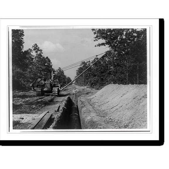 Historic Print, [The Big Inch pipeline under construction: The pipe being covered by machine], 16" x 20"