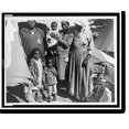 Historic Print, [Three African American women with three children in