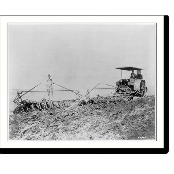 Historic Print, [Tractor pulling large set of discs across field], 16" x 20"