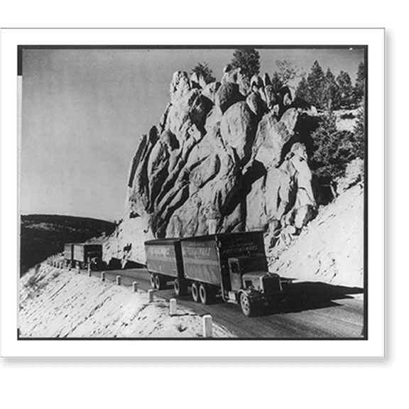 Historic Print, Trucks of Consolidated Freightways carrying war materials for the United Nations: 2 U.S. trucks in the mountains of Montana going to a Pacific coast embarkation point, 18" x 24"