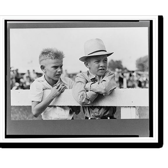 Historic Print, Two boys leaning on fence watching parade, state fair, Donaldsonville, Louisiana, 16" x 20"
