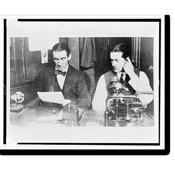Historic Print, [Two men seated in office, one with telephone and typewriter, the other sending a message by morse code], 16" x 20"