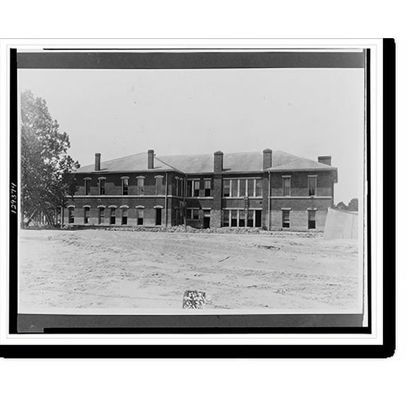 Historic Print, [Two story building with windows open or missing panes, dirt deposited by recent flood piled outside].Ewing, Inc., B.R. La., 16" x 20"