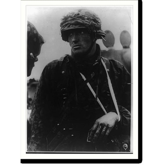 Historic Print, [Unidentified wounded German soldier with left arm in sling, wearing camouflage clothing], 18" x 24"