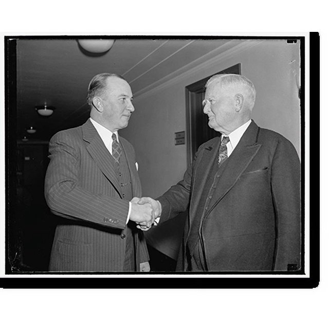 Historic Print, V.P. Garner congratulates Frank Hancock, new member of