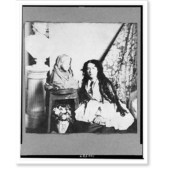 Historic Print, [Vinnie Ream Hoxie, full-length portrait, kneeling by two bust statues, facing slightly left], 18" x 24"