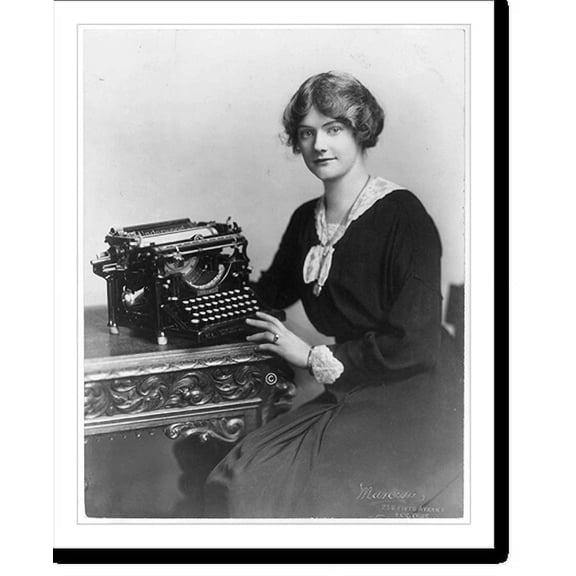 Historic Print, [Woman seated with Underwood typewriter], 18" x 24"