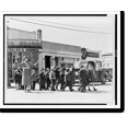 thumbnail image 1 of Historic Print, Woman traffic officer, part of a volunteer group of mothers patrolling school crossings in Red Bank, N.J., in 1951.Wide World., 16" x 20", 1 of 3