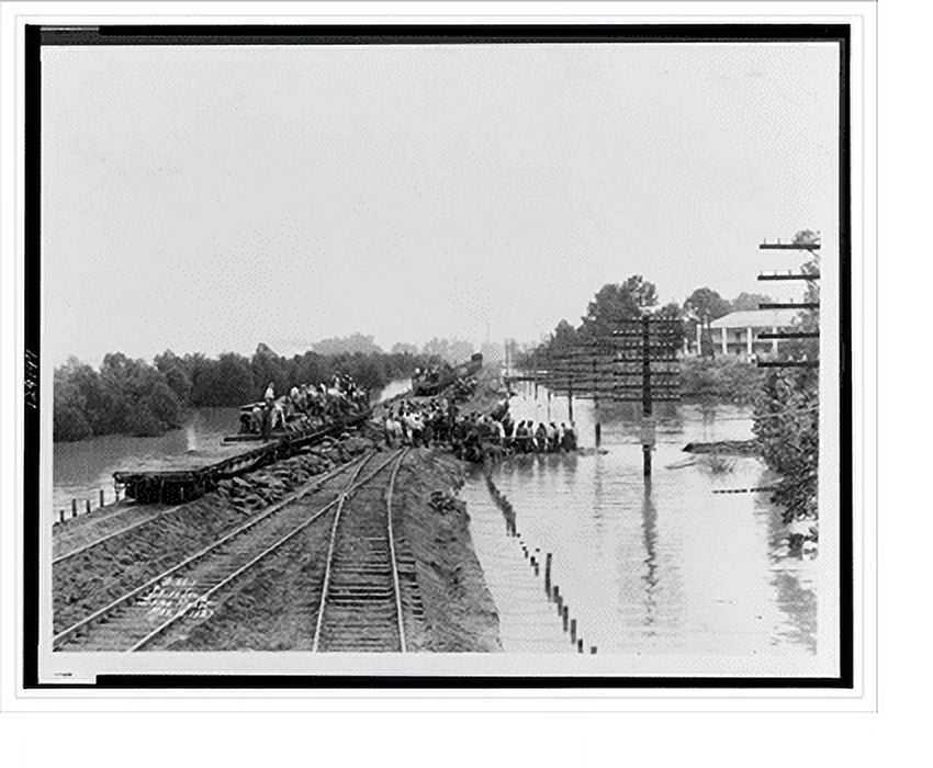 Historic Print, [Workers unloading sandbags from flatbed railroad car