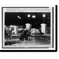 thumbnail image 1 of Historic Print, A military honor guard marches in front of the ambulance bearing the casket of the late President John F. Kennedy as it was returned to the White House early 11/23, 16" x 20", 1 of 3