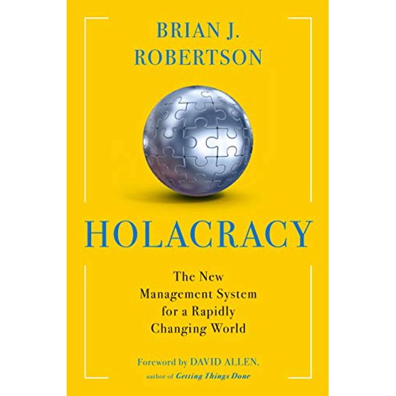Pre-Owned Holacracy: The New Management System for a Rapidly Changing World Paperback