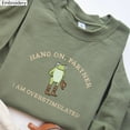 thumbnail image 1 of Hold On Partner I’m Overstimulated Frog Embroidered Sweatshirt, Cowboy Frog and Toad Unhinged Embroidery T-Shirt, Weirdcore Crewneck Hoodie, 1 of 4
