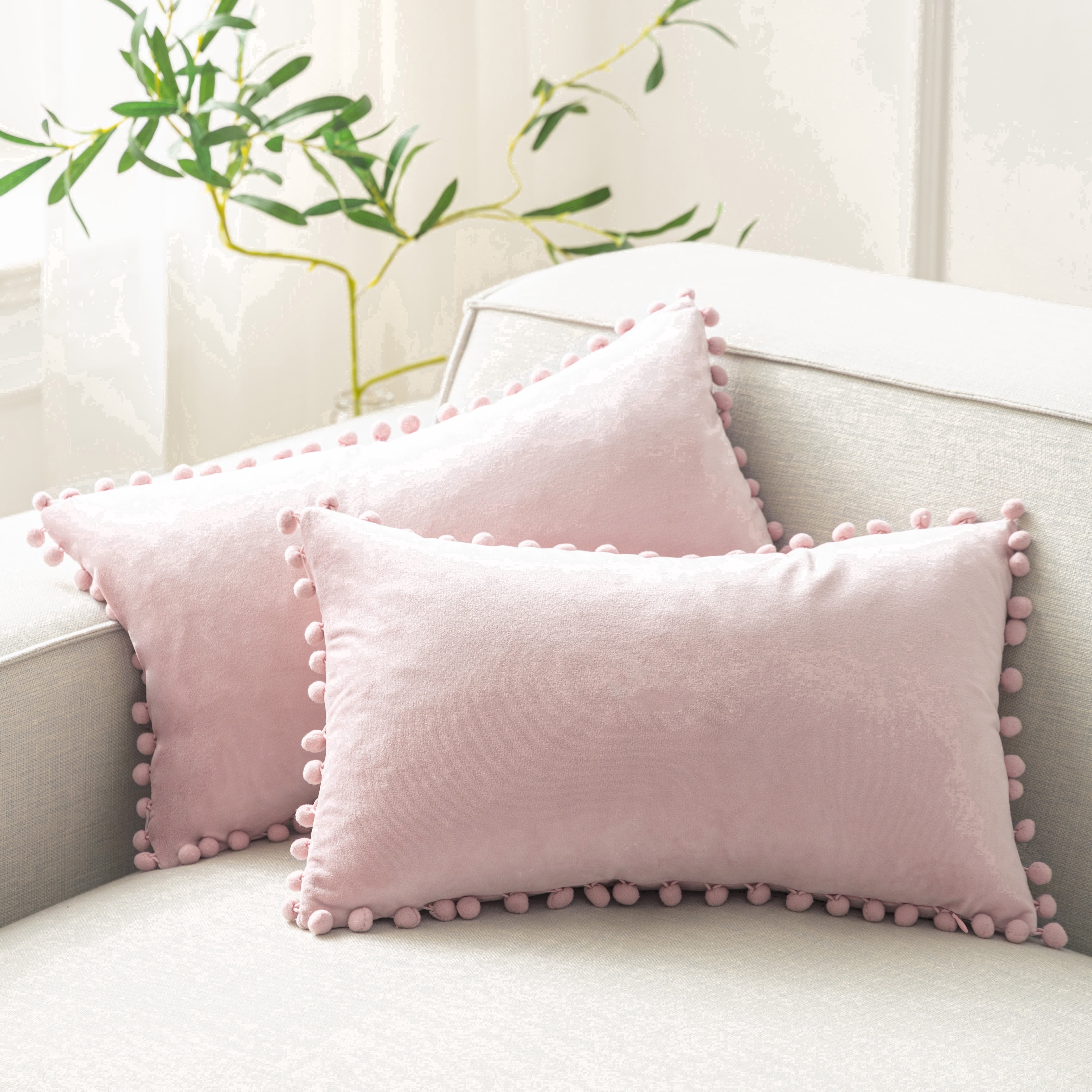 Phantoscope Light Pink Throw Pillow Covers 2 Pack, 12" x 20" Velvet Decorative Pillow Cases with Pom Poms, Soft Square Cushion Covers for Couch Sofa Bed