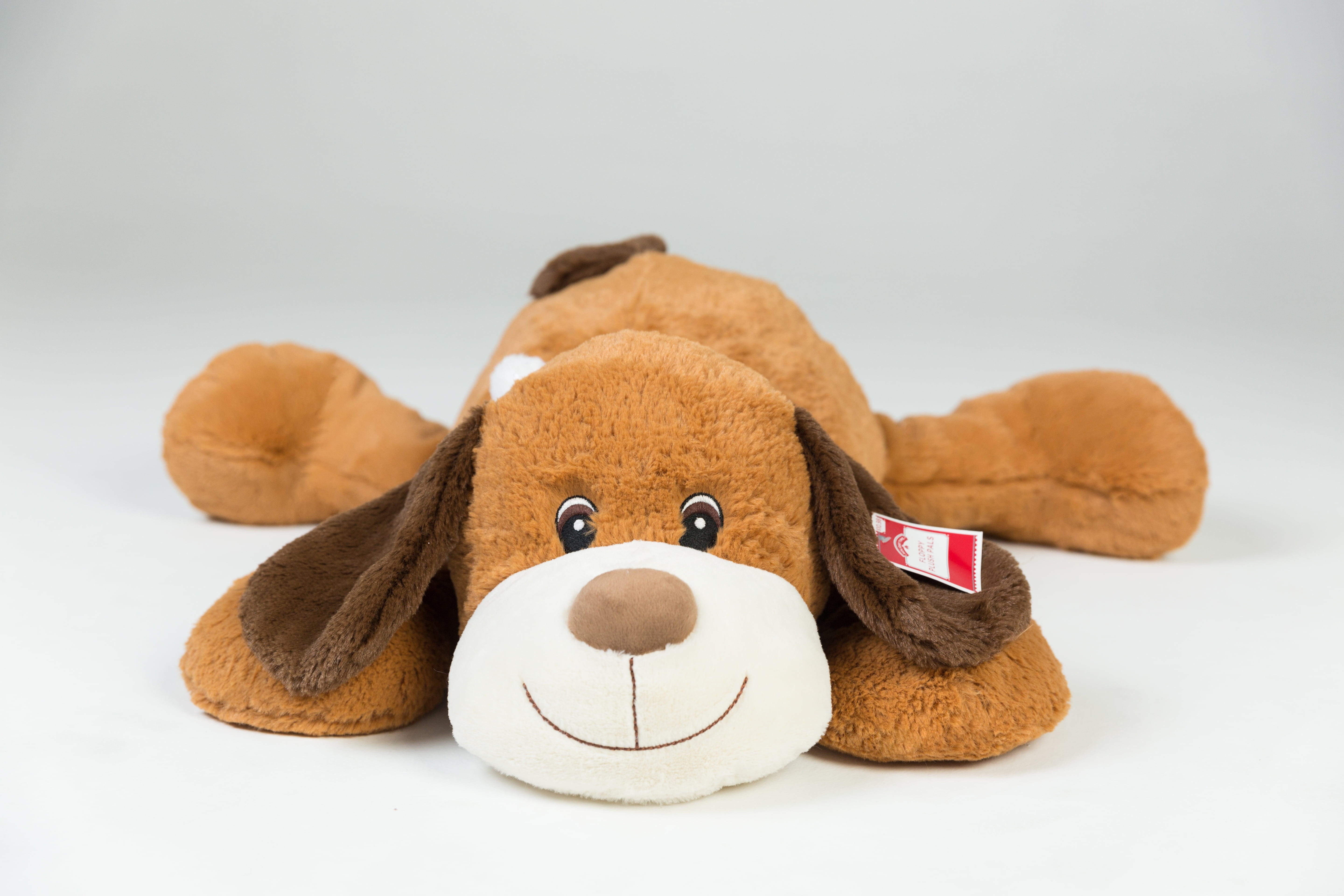 https://i5.walmartimages.com/seo/Holiday-Time-28in-Plush-Lying-Brown-Dog_841f5cf2-c5a3-4cdb-998a-a2f79c4b76bf.ab0b6fcc8900a2e108462d0599c4b85e.jpeg