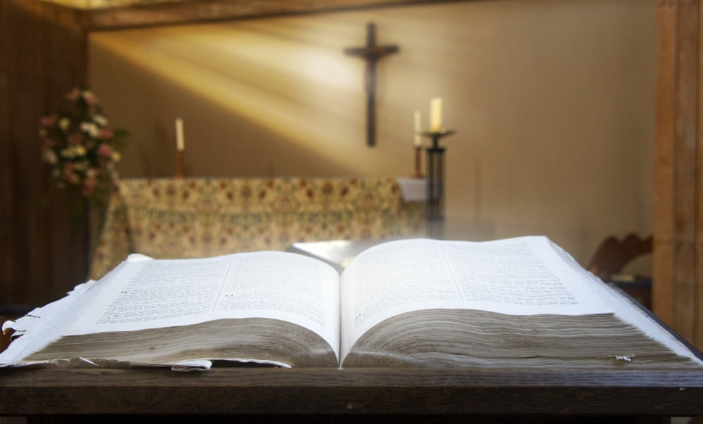 Holy Bible In A Church Canvas Art - John Short Design Pics (18 x 11)