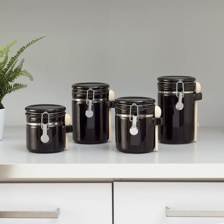 https://i5.walmartimages.com/seo/Home-Basics-4-Piece-Ceramic-Canisters-with-Easy-Open-Air-Tight-Clamp-Top-Lid-and-Wooden-Spoons-Black_fc8302f8-a771-4de8-ad79-39a3817df795_1.164aad1a8d66f95bdb805fec3d2fca0a.jpeg?odnHeight=768&odnWidth=768&odnBg=FFFFFF