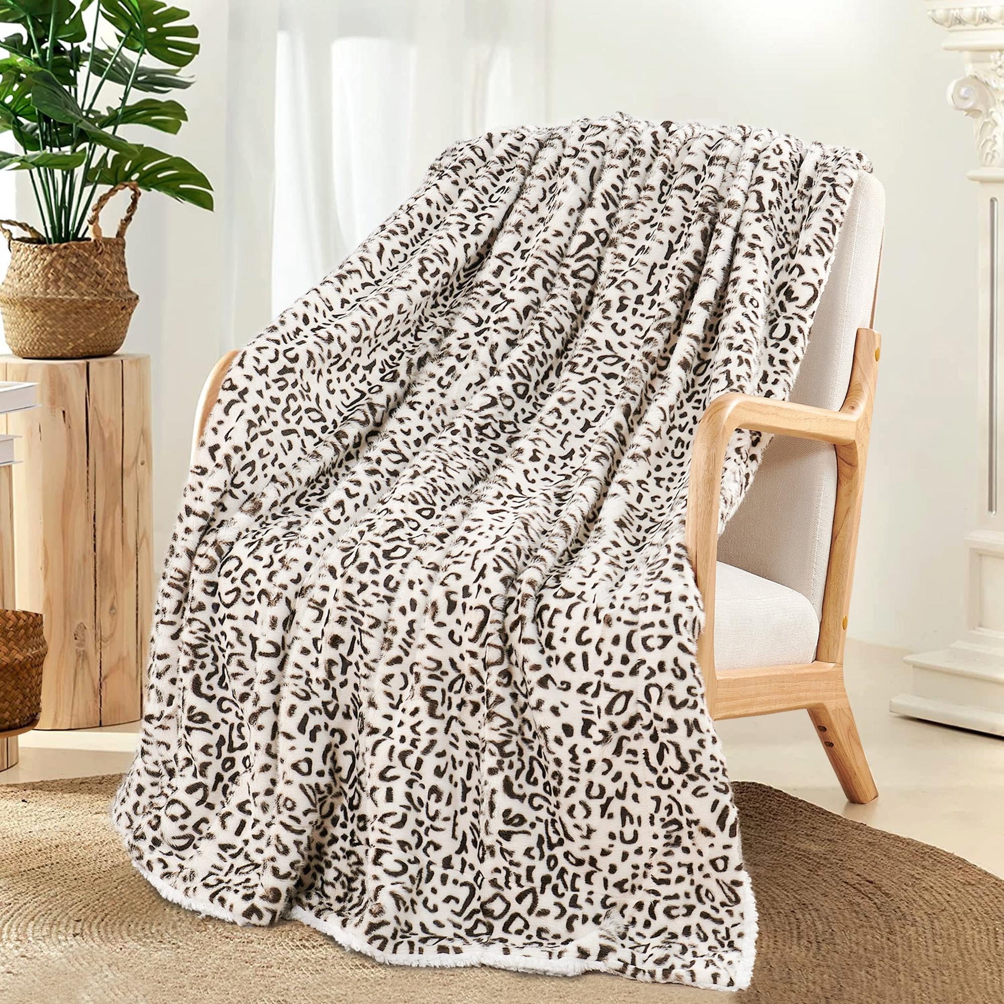 Faux snow leopard throw sale