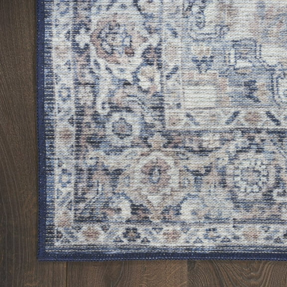 HomeRoots 10' Blue And Ivory Floral Power Loom Distressed Washable Runner Rug