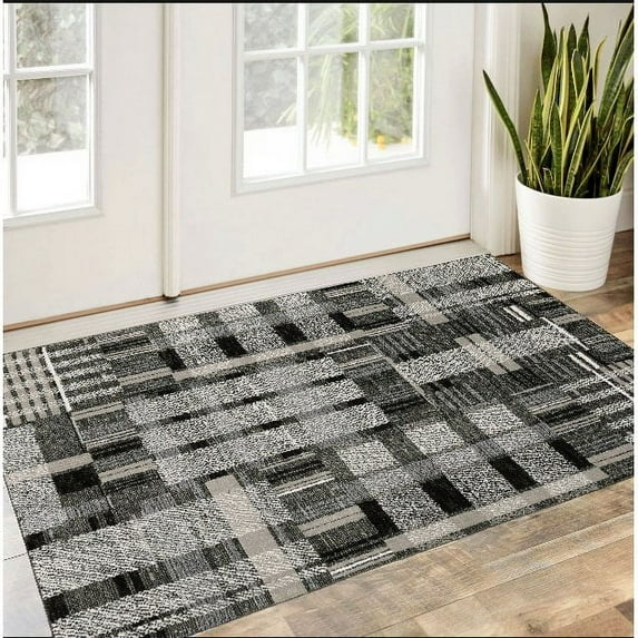 3' X 5' Black Grey And Ivory Geometric Power Loom Stain Resistant Area Rug