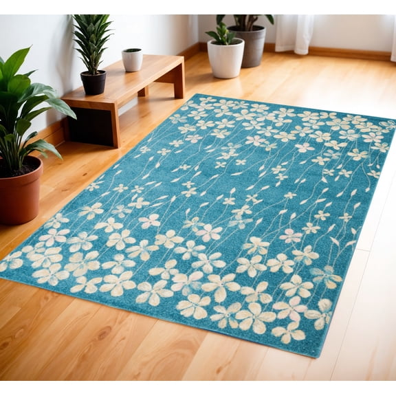 4' X 6' Turquoise and Cream Botanical Leaves Area Rug