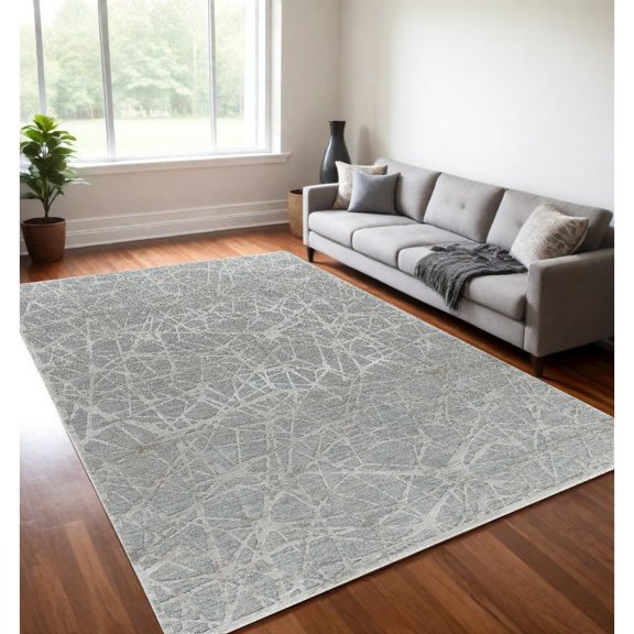 HomeRoots 5' X 8' Turquoise Abstract Power Loom Stain Resistant Area Rug