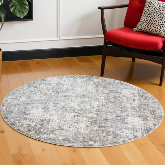 HomeRoots 6' Ivory Tan And Taupe Round Abstract Stain Resistant Area Rug