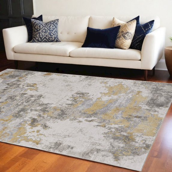 7' X 10' Ivory Gold And Gray Abstract Stain Resistant Area Rug