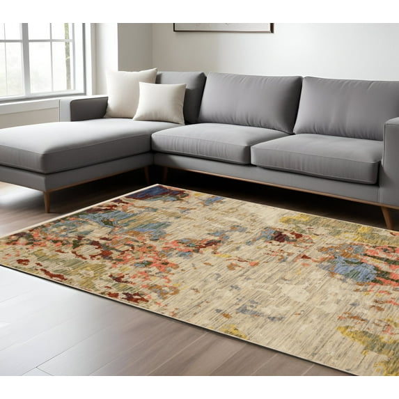 7' X 10' Beige Pink And Yellow Abstract Area Rug With Fringe