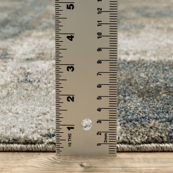 8' X 11' Teal Blue Grey Tan And Beige Geometric Power Loom Stain Resistant Area Rug