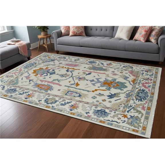 HomeRoots 566313 8 x 12 ft. Wool Floral Hand Knotted Rectangle Area Rug with Fringe, Blue, Ivory & Pink