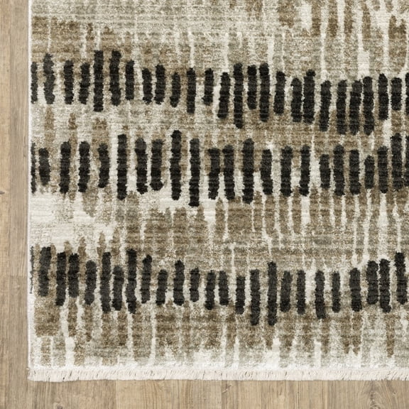 6' X 9' Beige Ivory Charcoal Brown Tan And Grey Abstract Power Loom Stain Resistant Area Rug With Fringe